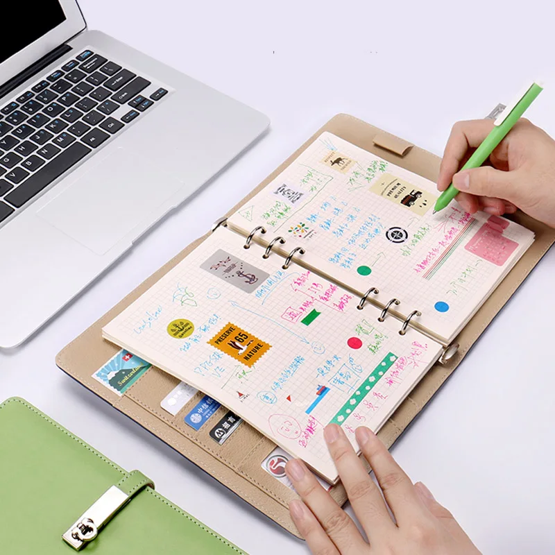 

HUA JIE A5 Loose-leaf Binder Diary Notebook with Strap Buckle business card Holder Pen Slot Documents Pouch 100 Sheets Lined Pad