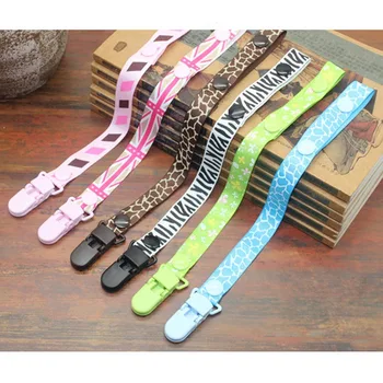 

Baby Pacifier Clip Chain Kids Cartoon Pattern Ribbon Soother Toys Dummy Pacifier Holder Leash Strap Nipple Holder Infant Feeding