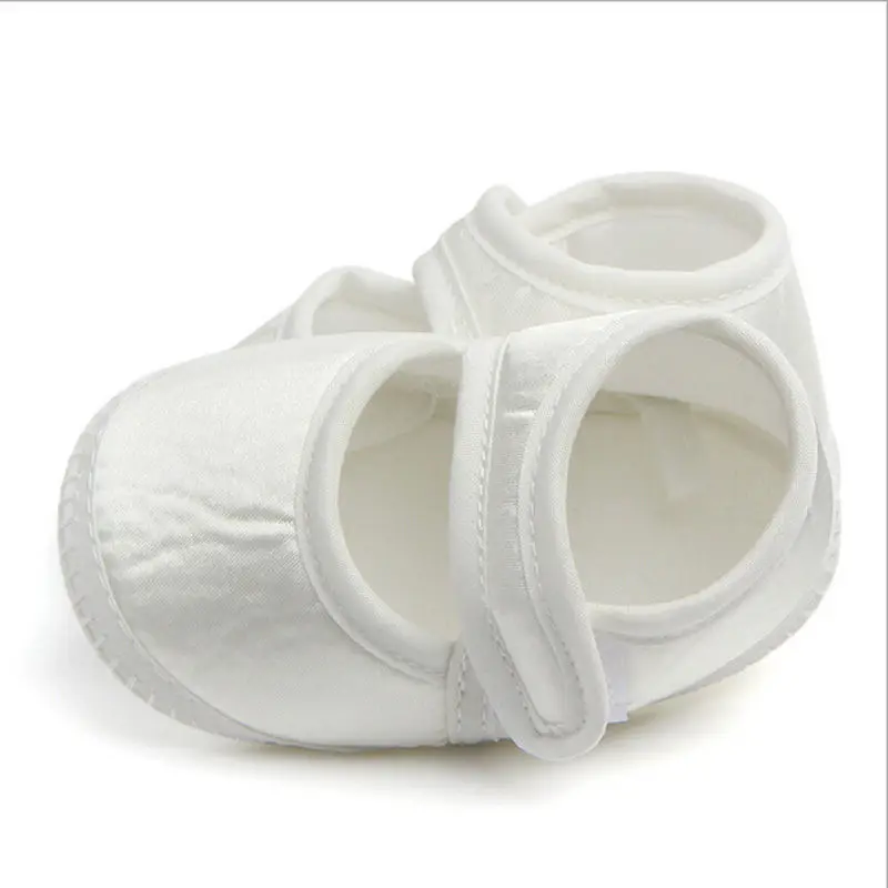 white hard bottom baby shoes