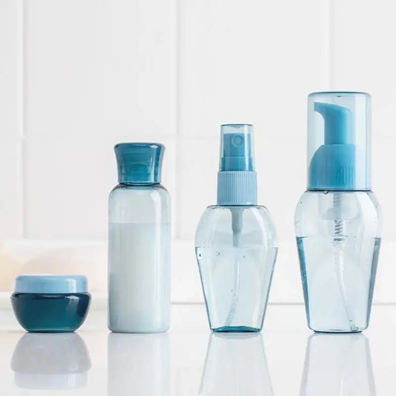

2019 Fine Mist Spray Bottles Press Type Cosmetic Spray Bottle Empty Clear Refillable Travel Containers