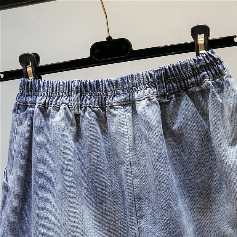 Новые летние корейские Джинсовые шорты Для женщин Повседневное сплошной высокой талией нерегулярные Зауженные джинсы шорты сбоку