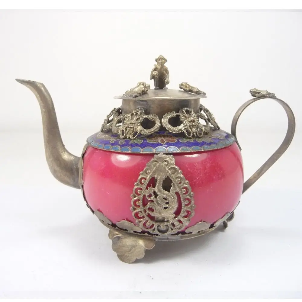 

Chinese Handwork Old Jade inlay Tibet Silver dragon teapot &Monkey Lid