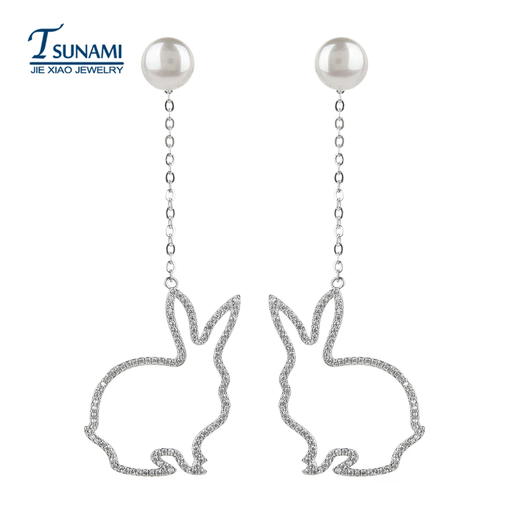 

High quality and luxurious white rabbit pearl zircon earrings. A chain of rocking zircon with a female friend's jewelry. ER-209