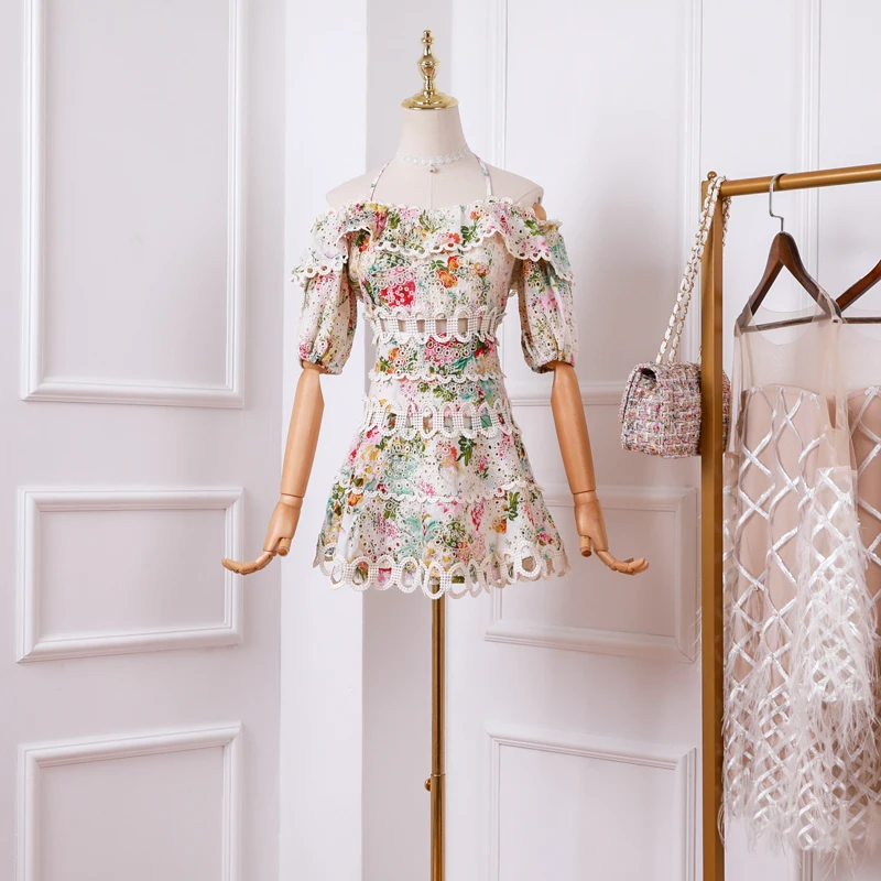 

New 2019 of the summer printed on holiday wind hollow out hanging neck web celebrity super strapless dress