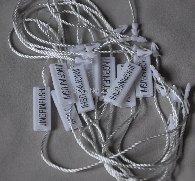 

Custom Private Brand logo text embossed seal for hang tags high class tag seal 10000pcs lot