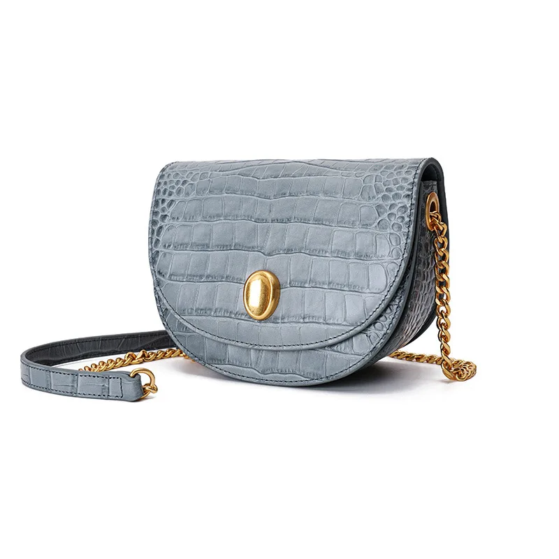 

Women's bag 2019 new saddle wrapped with net red chain bag small French niche air slant slant single shoulder wrap tide