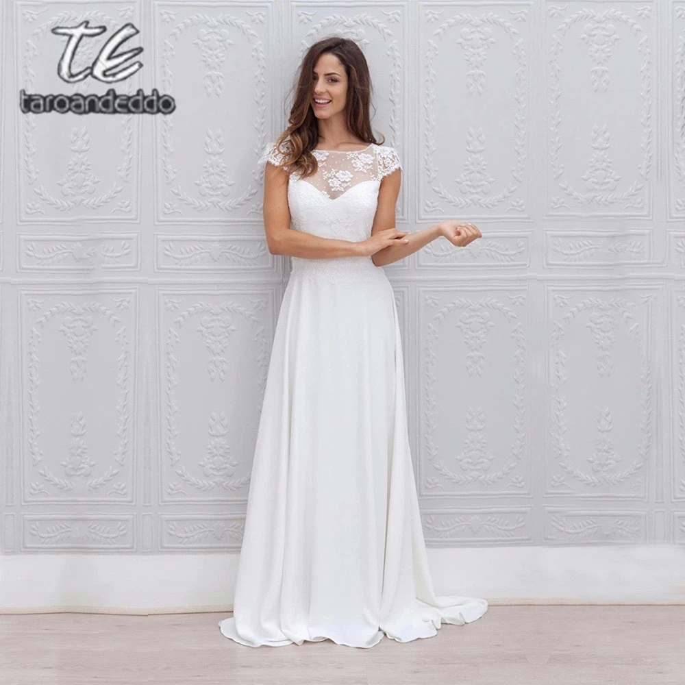 

Scoop Cap Sleeve Wedding Dresses A Line Illusion Open Back Floor Length Sweep Train Bridal Dress with Bow Vestido De Noiva