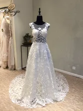 Luxury Wedding Dresses Plus Size Lace Appliques 2017 Sheer Neck Sleeveless Backless Sweep Train Bridal Gowns Robe De Mariage