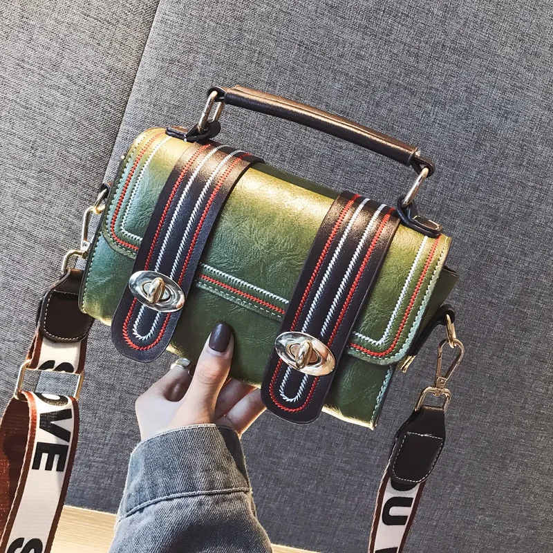 

Boston handbag with simple retro embroidered threa, wide shoulder strap, one shoulder and oblique shoulder