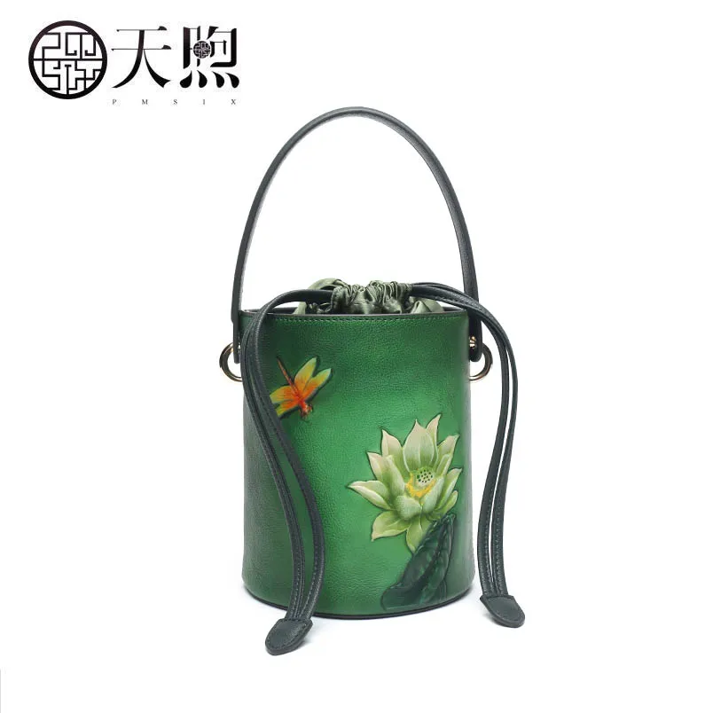 

First layer cowhide bucket bag female 2019 new leather retro embossed national wind hand strap shoulder slung small bag