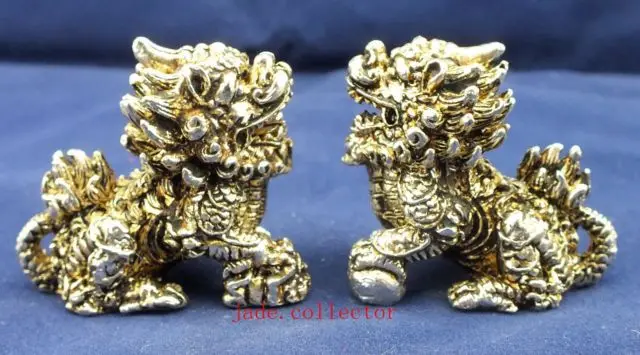 

A Pair of Chinese Tibetan silver Guardian Lion kylin Statue