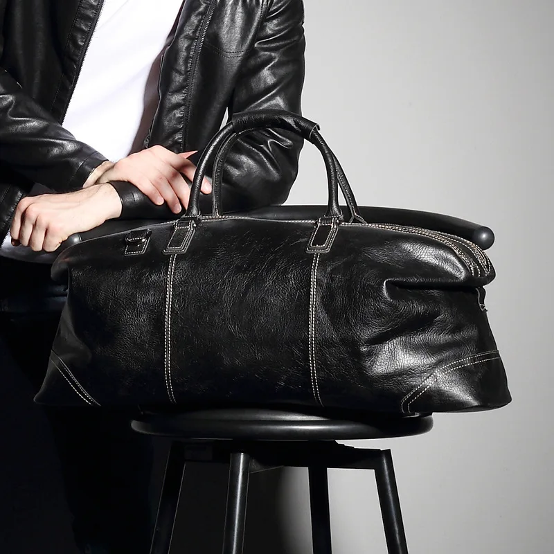 

Leather travel bag men's handbag large capacity business travel luggage top layer leather travel bag