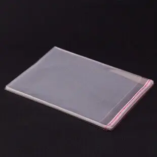 

Wholesale (100pcs/lot) Transparent Pasted OPP Packing Bags for Pendant / Rings / Earrings / Bracelets Jewelry 9x7 cm