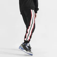 Fashion Streetwear Men Sweatpants Loose Fit Side Stripe Spliced Designer Casual Joggers Pants Men Slack Bottom Hip Hop Pants curve bottom side slit hip hop longline tank top