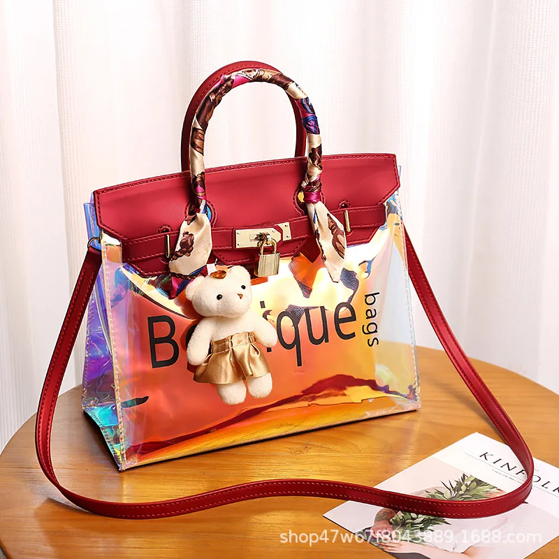 

New Printed Lady's Hand Jelly Bag, Single Shoulder, Korean Master Bag, Fashion PVC Slant Laser Transparent Bag
