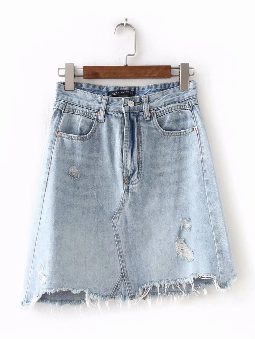 Women stylish holes mini denim skirt irregular pockets tassel European