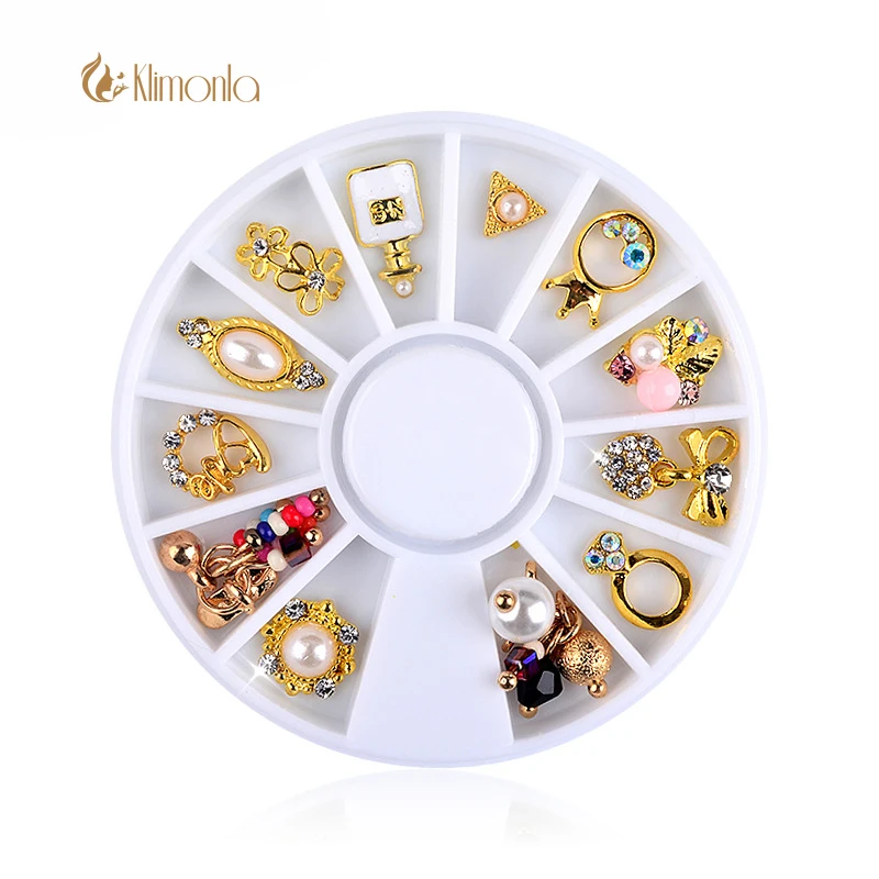 

Pearl Rhinestone Nail Decoration Kit in Wheel Crown Flower Bow Cute design 3D Oval Square Triangle Nail Art Ornament Pendant