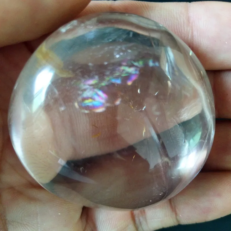 A Natural quartz crystal palm stone with rainbow yoga practice plaything chakra healing crystals