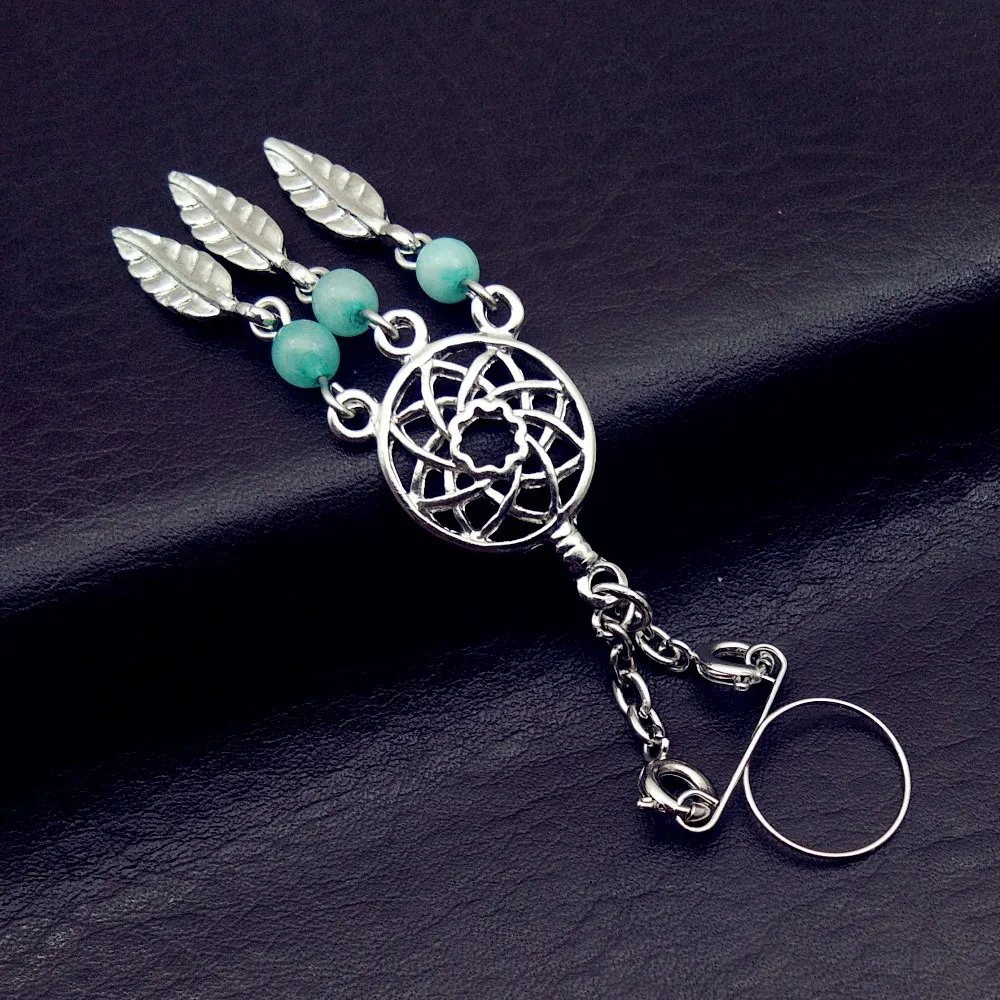 nolan miller rose brooch