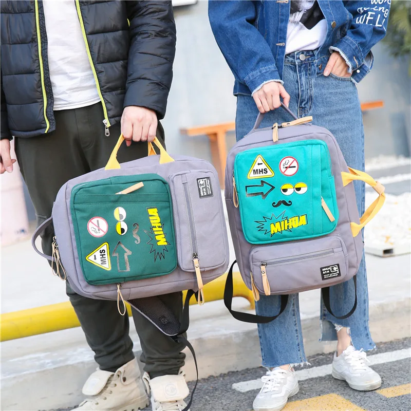 

Factory direct sales of the new Korean version multi-purpose shoulder canvas color backpack graffiti bag computer bag