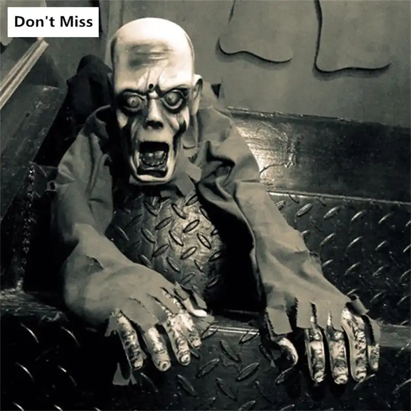 crawling zombie doll