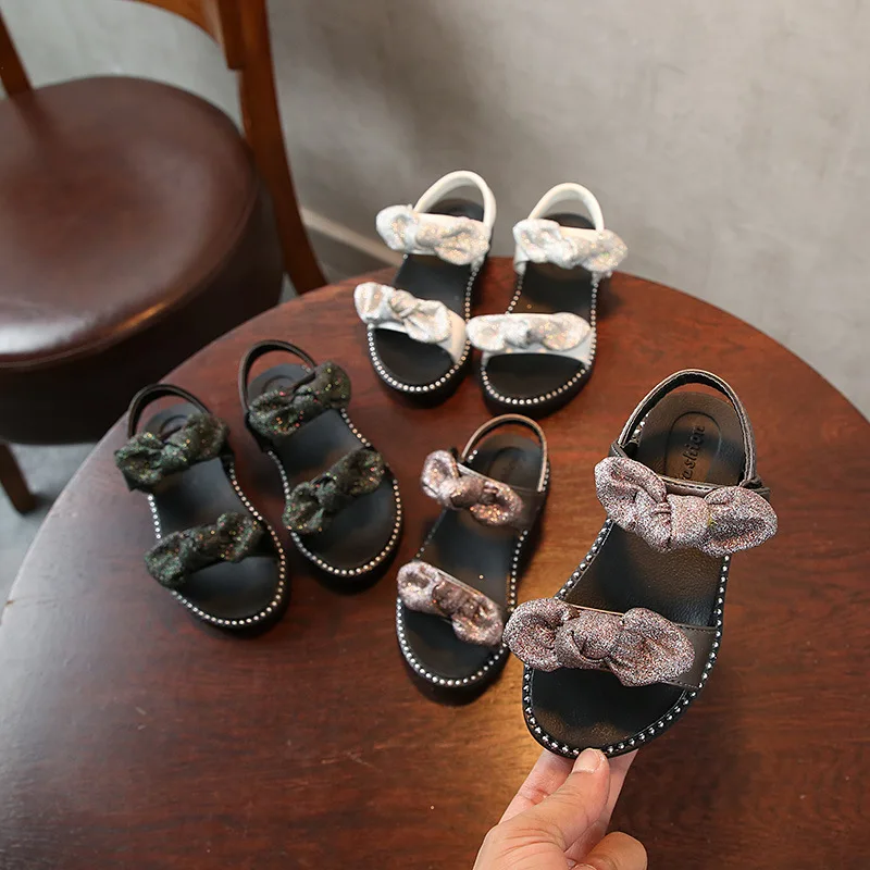 High quality Summer Fashion Girl Sandal Children Girls Flat Rome Sandal Bling Bling bowknot Kids Shoes black silver High quality Summer Fashion Girl Sandal Children Girls Flat Rome Sandal Bling Bling bowknot Kids Shoes black silver