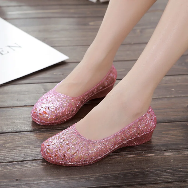 

Hot Selling Factory Price Ventilate Crystal Jelly Hollow Out Birds Nest Flat Sandal New Summer Beach Shoes