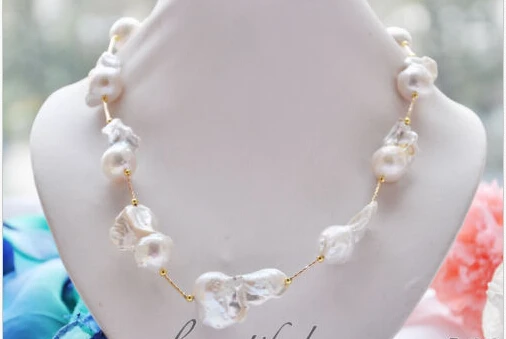 

Free shipping@@@@@ HUGE 17" 35MM WHITE BAROQUE KESHI PEARL NECKLACE Magnet clsp