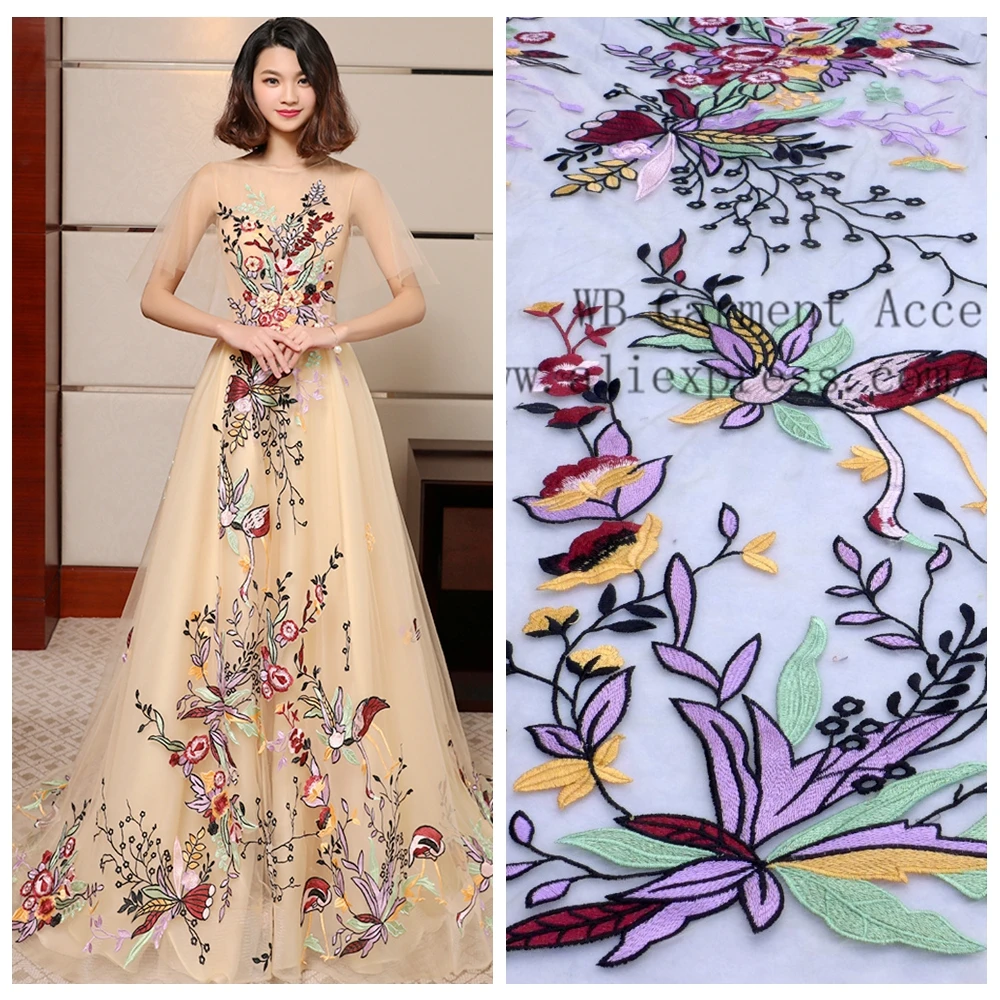

High quality mixed colors on net yarn embroidery lace fabric fashion show dress/party dress lace fabric by yard