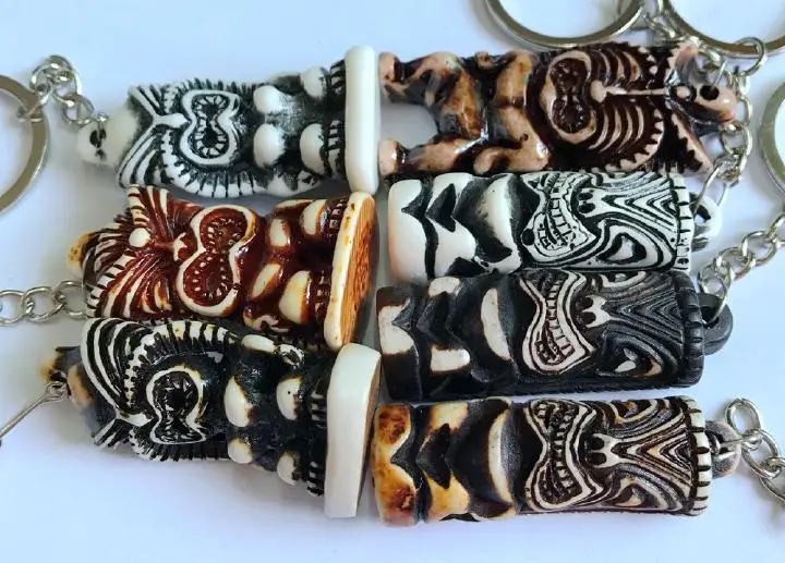 

Free Shipping 12 pcs Creative accessories imitated tiki totem rock keychain