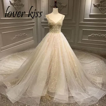 شراءعاشق قبلة Vestido دي Noiva سباركلي V الرقبة السباغيتي الأشرطة فساتين الزفاف مطرز كريستال العروس الزفاف أثواب ريال صور فاخر