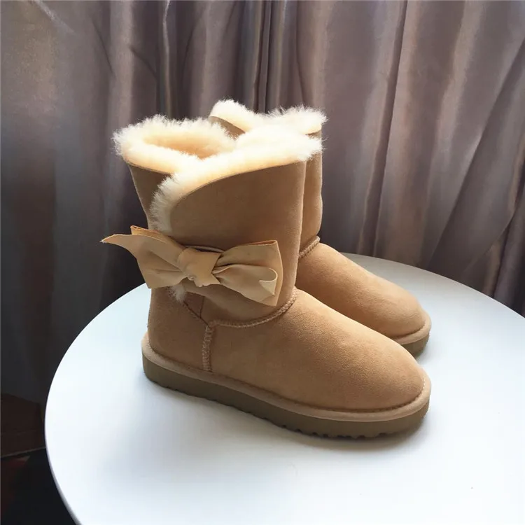 

Bowtie China Brand genuine sheepskin and real wool Snow Boots women's Fashion winter free Warm Botas Mujer