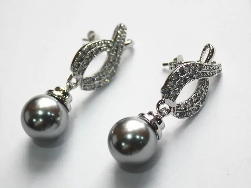 

latest fashion lady's beautiful silver plated leave shape +12mm gray shell pearl bread earring