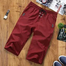 Лето Лидер продаж мужские Шорты до середины икры Длина Фитнес бодибилдинг моды Повседневное тренировки Марка укороченные штаны Высокое качество Пот Штаны