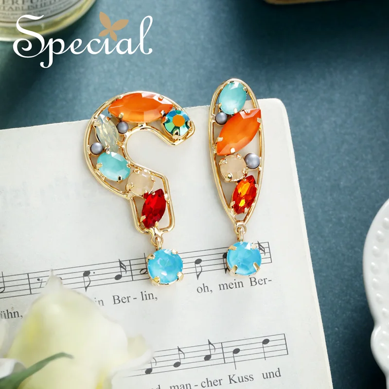

Special European and American 925 Silver Needle Girls Heart asymmetrical question Point earrings female ear Nail earrings unknow