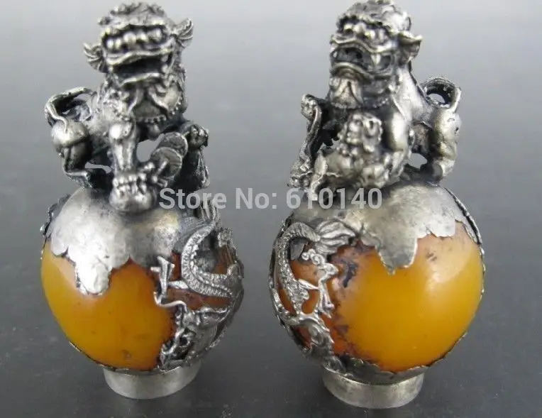 

A pair of beautifully Yellow carved small lion NR Staue