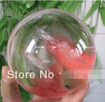 

A PRETTY SMELT QUARTZ CRYSTAL red SPHERE (0601)