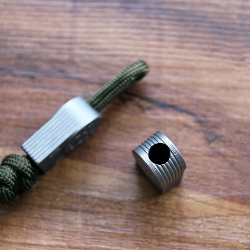 Sprited-Away-No-Face-Man-Titanium-Knife-Beads-Pendant-Hanging-Buckle-EDC-Umbrella-Rope-Pendant-Paracord (3)