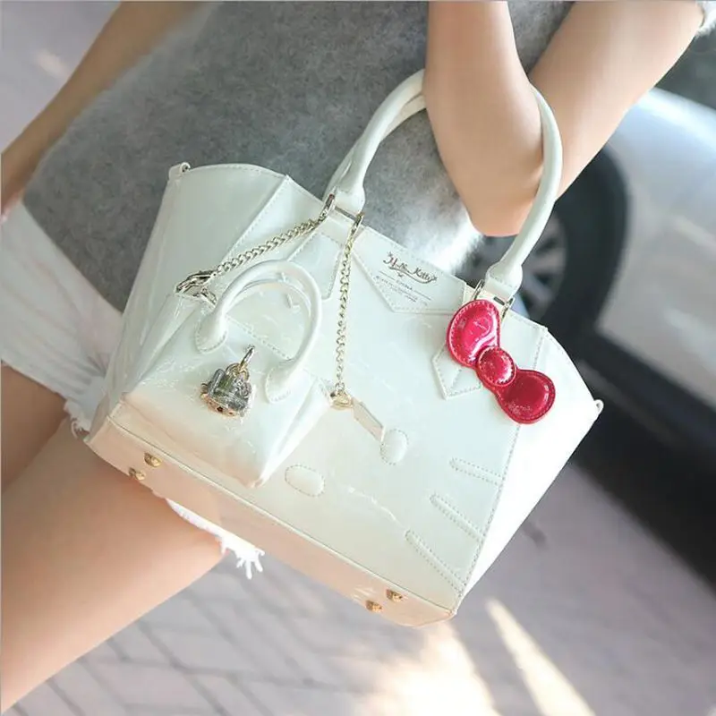 

Free shipping 2017 NEW Luxury famous brand hello kitty handbags shoulder tote bag women female ladies casual bags leather