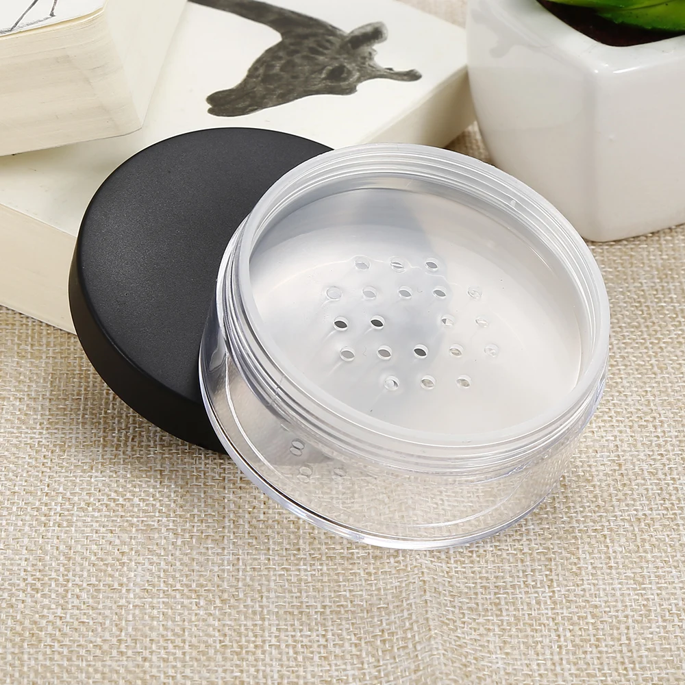 

2018 Newest Top Selling 50g Plastic Empty Loose Powder Pot With Sieve Cosmetic Container with Black Cap Handheld for Travel Use