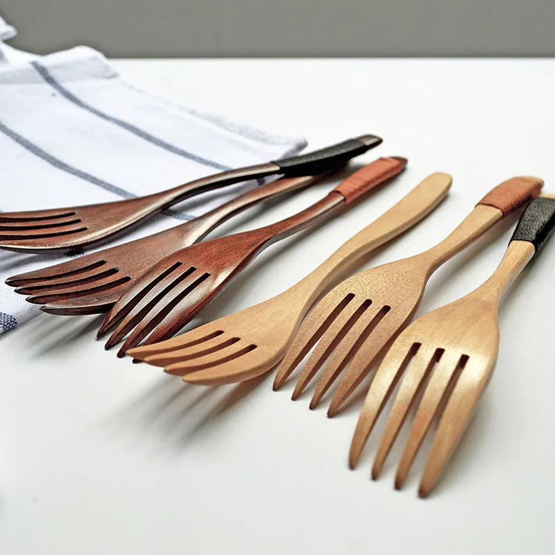 

Wavy handle Japanese style wood color tangled line wooden personality solid color water toss craft fruit fork