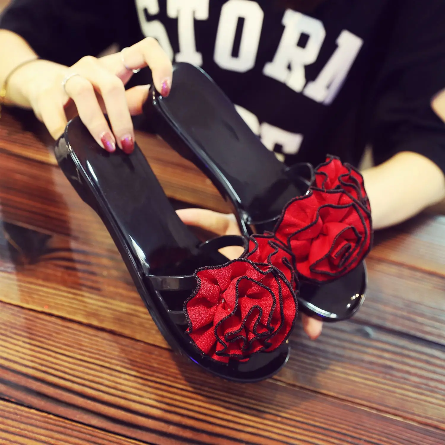 red designer flip flops