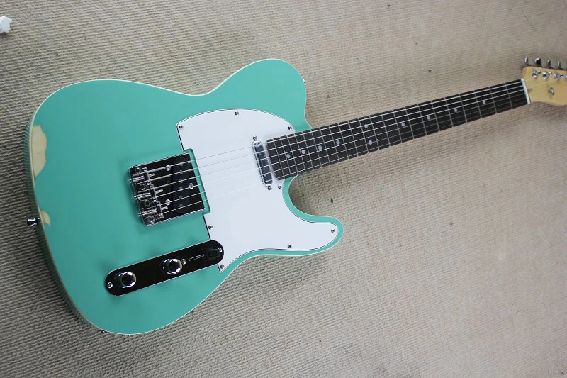 

Factory Blue Vintage Style Electric Guitar with Chrome Hardware,White Pickguard,Rosewood Fretboard,Can be customized