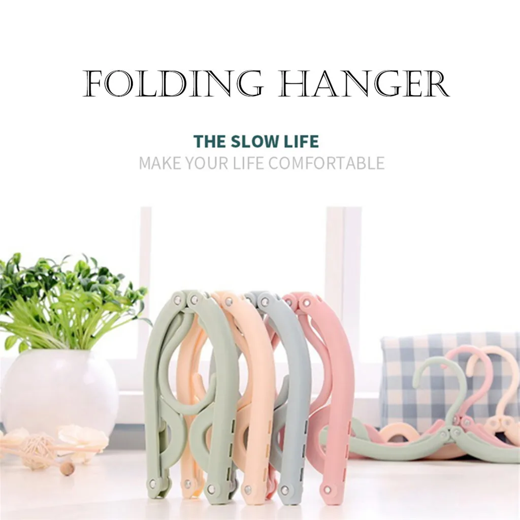High Quality New Magic Portable Folding Plastic Coat Hanger Travel