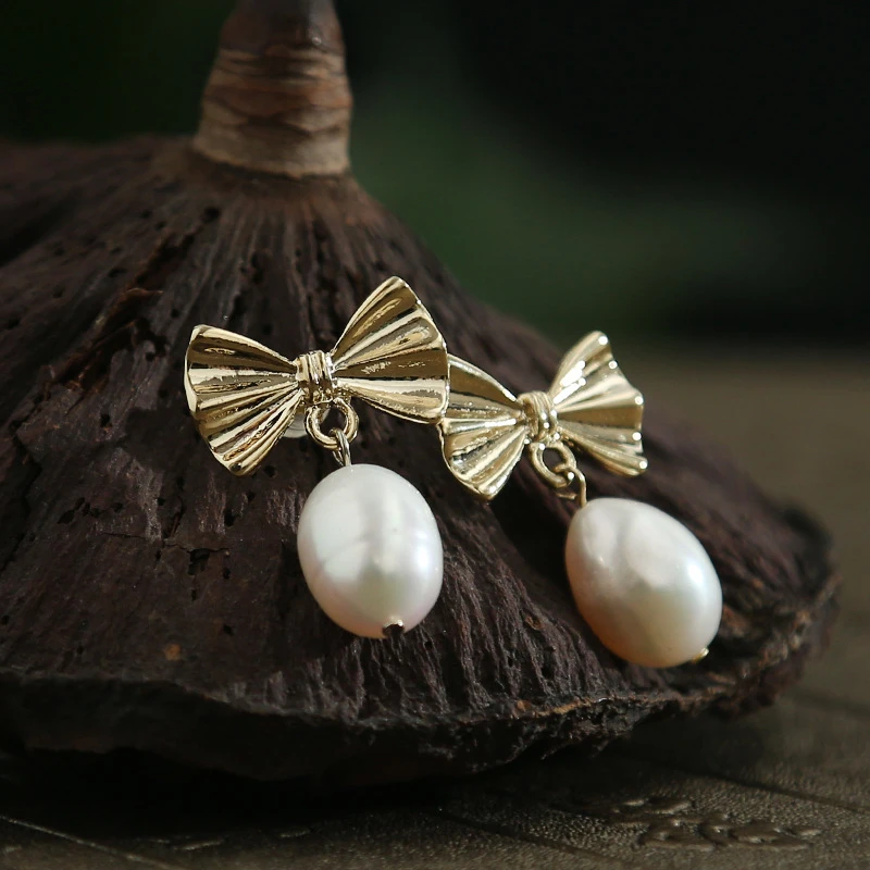 

2019 Fashion New Natural Pearl Copper-plated Butterfly Knot Fashion Baitao Princess Earpendant earing