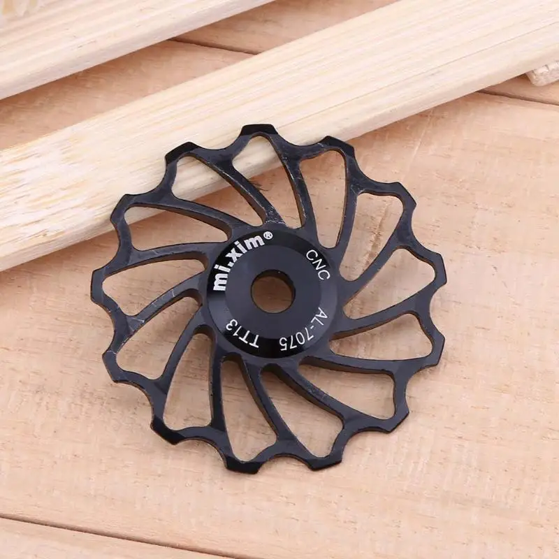2 pcs دراجة السيراميك تحمل بكرة عجلة 13 T الألومنيوم دراجة بسبائك الخلفية Derailleur دليل الدراجات السيراميك تحمل أجزاء 2 pcs دراجة السيراميك تحمل بكرة عجلة 13 T الألومنيوم دراجة بسبائك الخلفية Derailleur دليل الدراجات السيراميك تحمل أجزاء