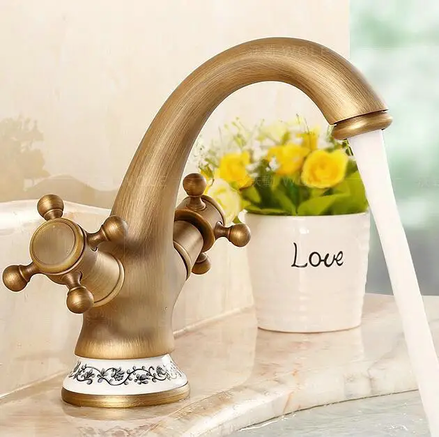 

Free Shipping antique finish dual hand Bathroom Sink Faucet with ceramic base Bronze Hot &Cold Basin Mixer Tap H-7569