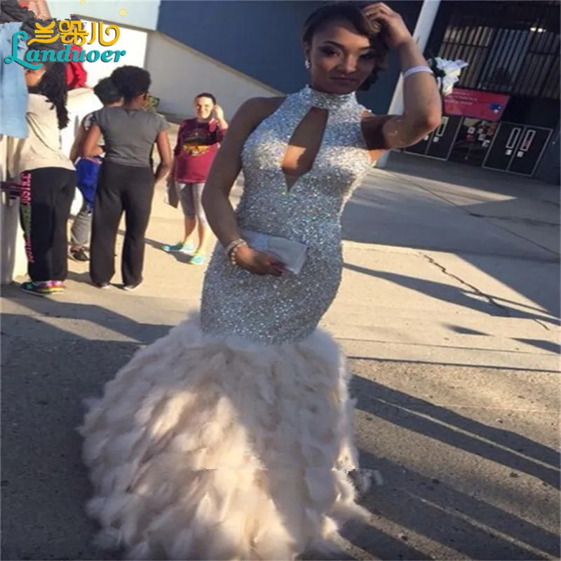 white mermaid prom dress with feathers