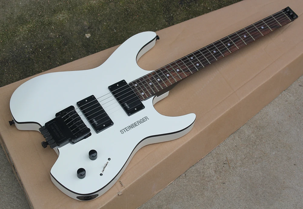 

White Headless Electric Guitar with EMG Pickgups,Tremolo,Rosewood Fretboard,Black Binding,offering customized services