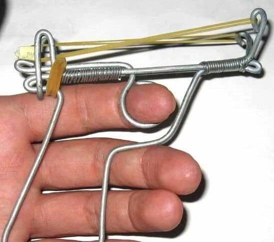 Traditional-old-fashioned-iron-wire-gun-